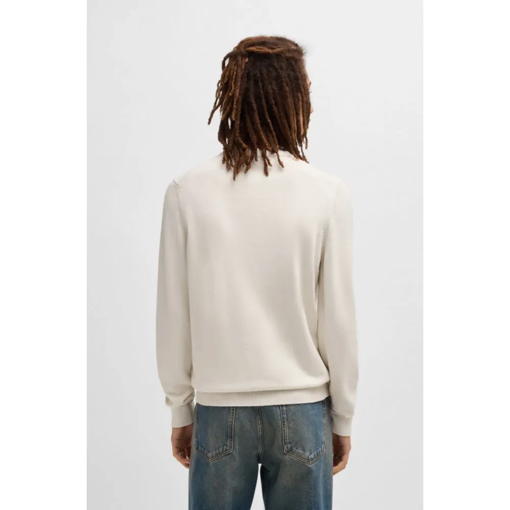 Knitted cotton sweater with red logo label