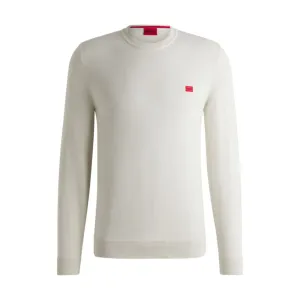 Knitted cotton sweater with red logo label